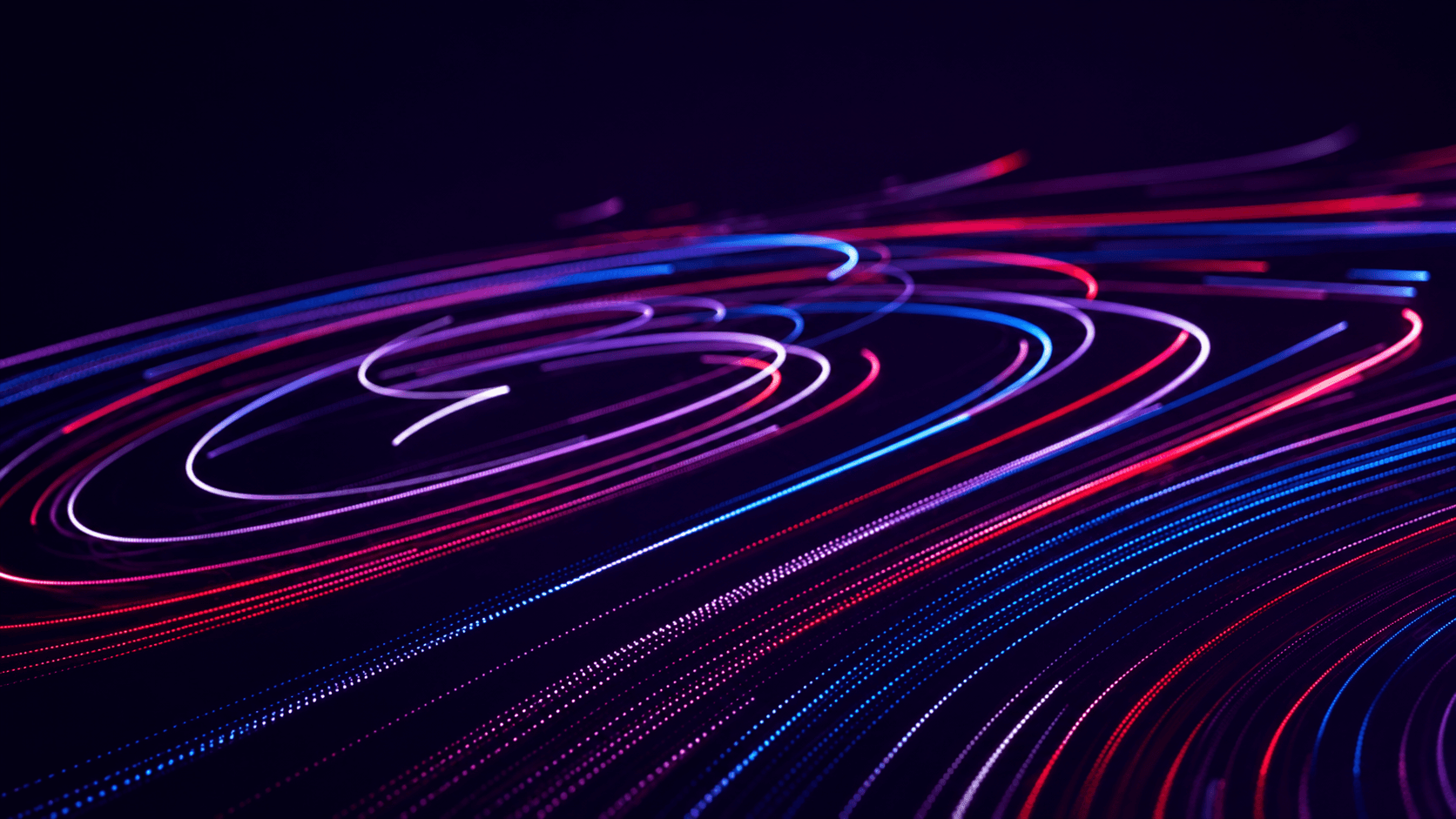 Lineas curvas de luz azul y roja sobre fondo oscuro
