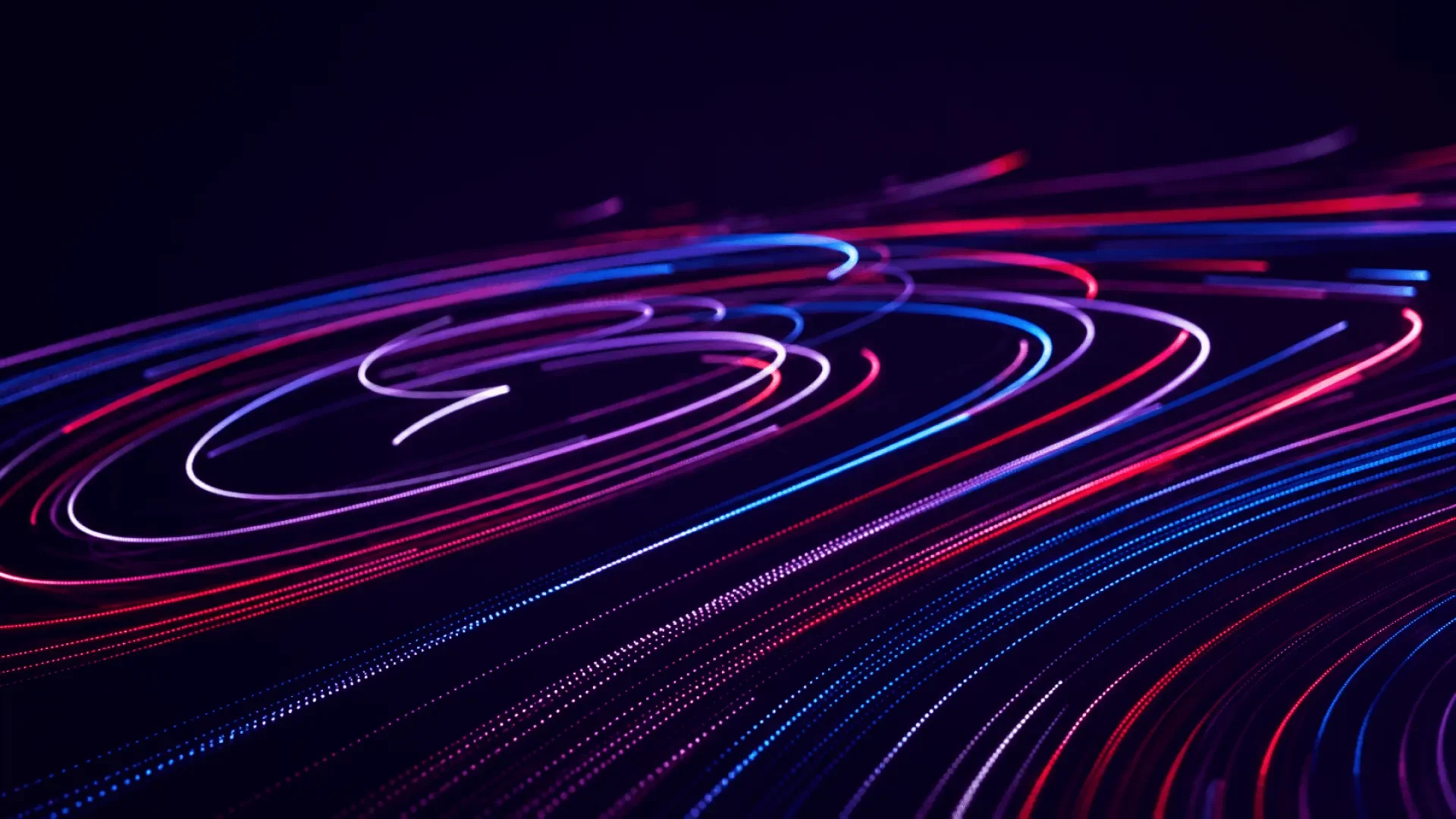 Lineas curvas de luz azul y roja sobre fondo oscuro